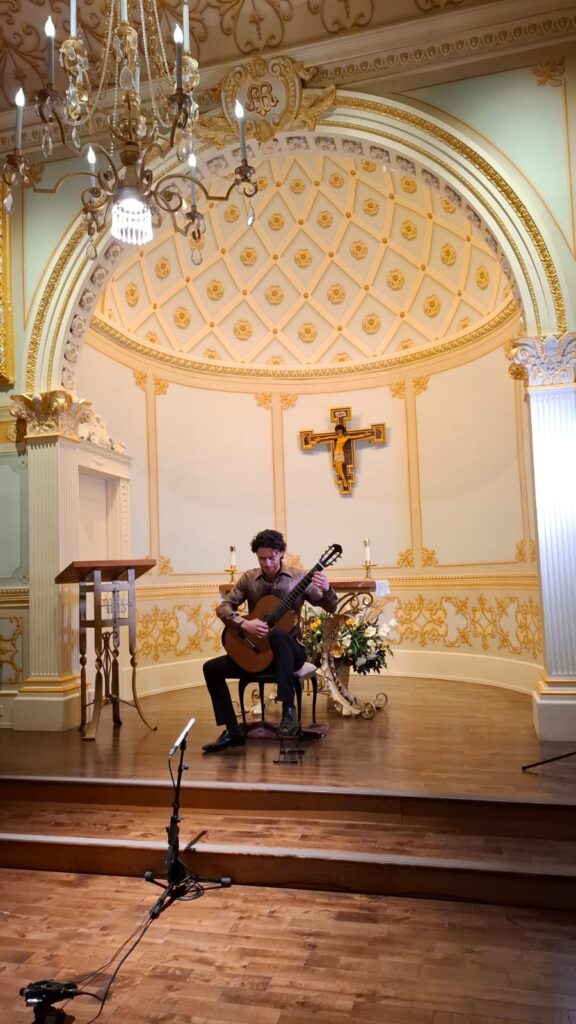 Dante performing in a chapel